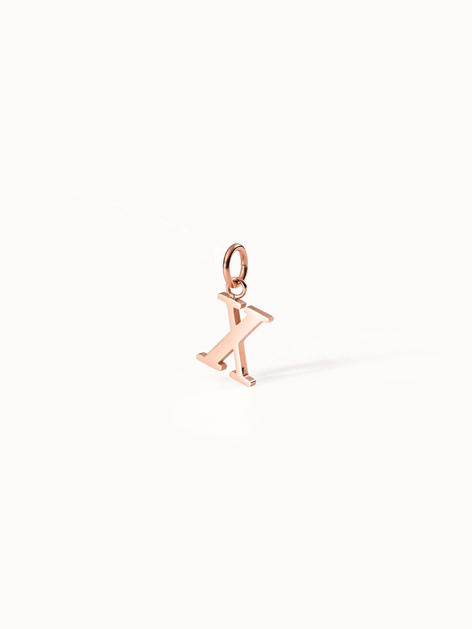 Roségoldener Pure X Charm Anhänger aus 18K vergoldetem Edelstahl, minimalistisch, elegant und femininer Island-Spirit von PURELEI.