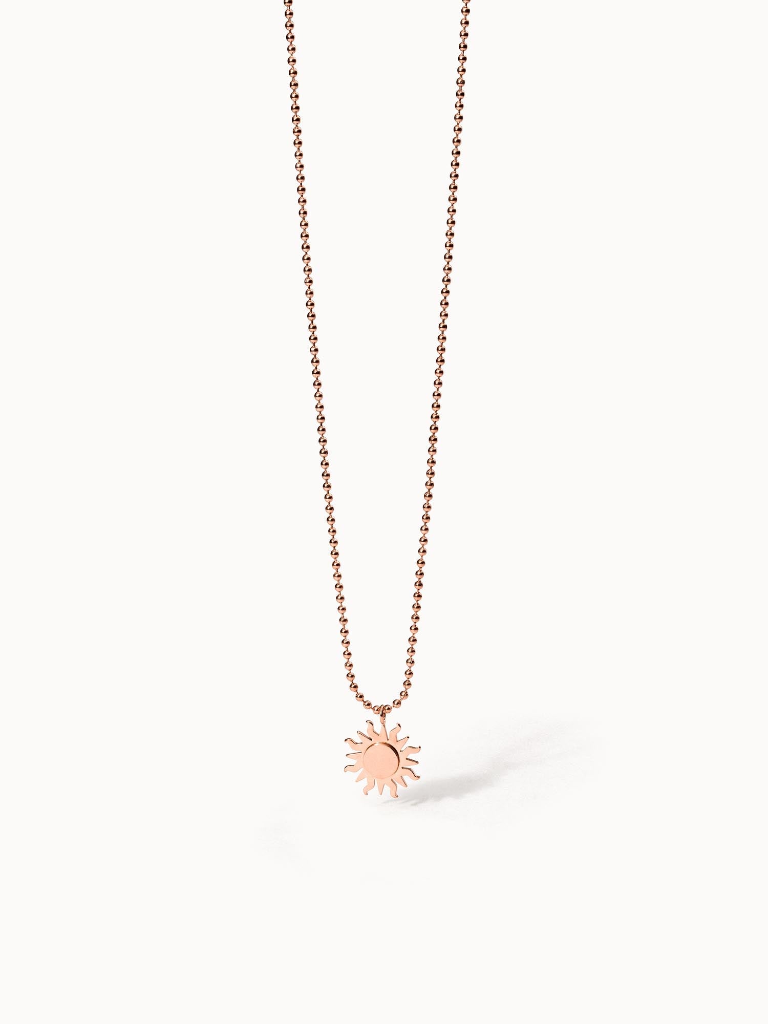 Roségoldene Kette mit Sonnenanhänger, PURELEI, elegant und strahlend.