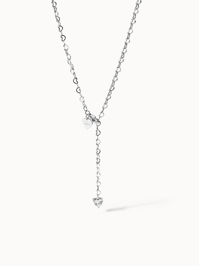 Silberne Kette mit Herzanhängern von PURELEI, elegant und verspielt.