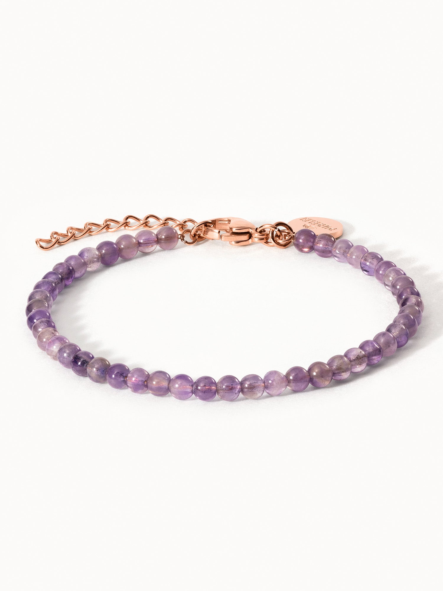 Amethyst Armband von PURELEI mit roségold vergoldetem Edelstahl und natürlichen lila Perlen, elegant und feminin.