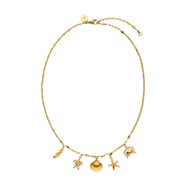Goldene Kette mit maritimen Anhängern von PURELEI, elegant und verspielt.