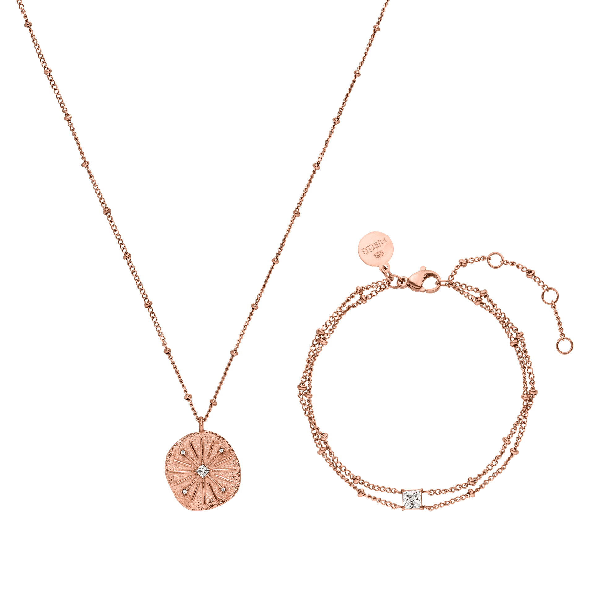 Roségoldene Kette und Armband mit funkelndem Anhänger von PURELEI, elegant und feminin.
