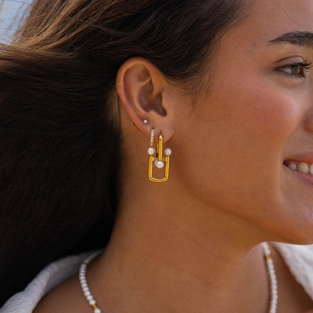 Roségoldene Ohrringe mit Muscheln, elegant und modern, von PURELEI.